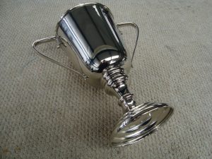 Trophy engraving removal & plating